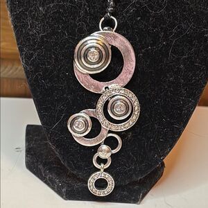 Vintage Sculptural Silver Tone Swirl Rhinestone Pendant black corded necklace